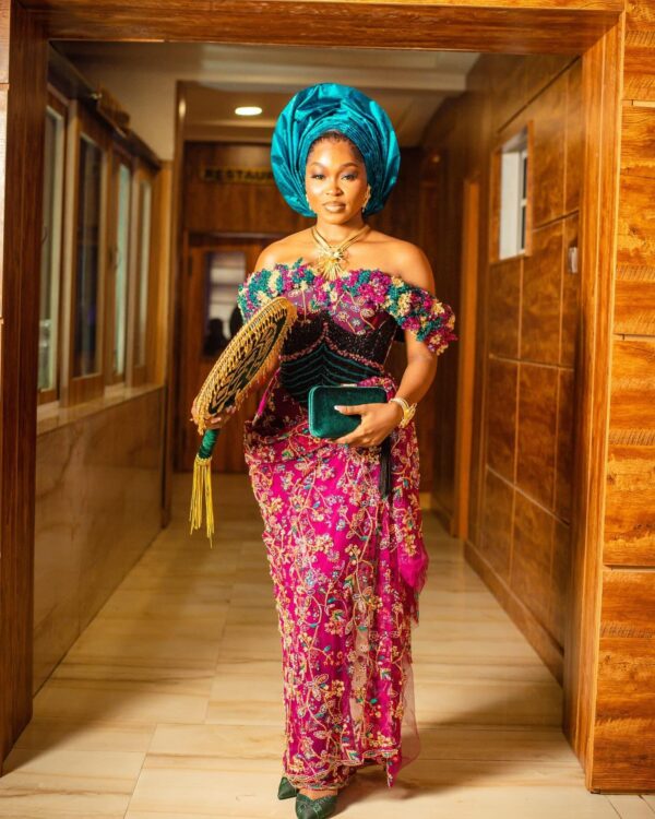 African Bridal Wedding Lace Dress With Off Shoulder Neckline And Draping Alongside Structure Sleeves (1)