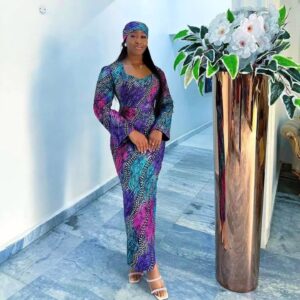 The Q1 2025 is about to end and AJ-Label has decided to put together the latest ankara long gown styles for 2025 Q1. Ankara long gown styles, has been always been a favorite pick for many wedding guest who love the African wedding fashion attires, ankara long gown styles as a matter of fact is one of the elegant African dresses for weddings. For most wedding guest who love different style of African dresses, especially for African attire wedding, over here at AJ-Label, we wouldn't want you to keep stressing over where to get the latest ankara long gown styles for your next wedding attendance.  Let's get right into it with the latest ankara long gown styles Q1 2025 AJ-label. The first Latest Ankara Long Gown Styles For Wedding Guest in the Q1 2025 edition is this African dress plus size design we have here, why this style is considered as the African print dress for plus size is because it's a latest ankara long gown style that needs ladies with wider hips to get it right. Let's look at the close up view of this African print dress for plus size. This latest ankara long gown style comes with little lace designed around the tommy areas and laid down the side. The boobs are on the ankara fabric is covered with lace and Red beading, the shoulder is covered with Red beads too. The down part of this African print dress for plus size is a bit flare in nature with a tail at the back, and the flare covers down to the shoes. This is the best latest ankara long gown style for plus size women. Here's a straight cut Latest Ankara Long Gown Styles For Wedding Guest, it's a simple African wedding dress styles for ladies who love to keep things simple. This African fashion wedding dress has a simple yet fancy strap sleeves.  Here's a more frontal view of this prints fabrics African dress styles for weddings, you can see that this latest ankara long gown style, doesn't come with an illusion net, but the upper bust area is fully padded to avoid revealing too much cleavages. This African fashion wedding dress for guest come with some lining in front for more beautification. This will be the first African Maxi Dress on our list, that's basically one of the latest ankara long gown style. This Ankara long gown is also considered the boubou dress but this time made with African print dress, it has been a trending ankara styles for ladies over the years. This very latest ankara styles for wedding is designed and sewed with a V neckline pattern. While this latest ankara long gown style has been an ankara styles for plus size women over the years, many ladies still love to rock it for wedding guest events. We can't skip this stunning Ghana wax clothing in our list of latest ankara style for wedding 2025. Let's start by looking at the flare of this African wedding dress Ghana outfit, it is spacious enough for easy movement. The underneath has a black extra material with little steps. Now the close up view of this African wedding dress Ghana outfit, comes with a double folded structure sleeves, the first structure is  slightly above the left shoulder, while the other one is rounded across the bicep. This African dress styles for wedding guest is one of best African wedding dress Ghana outfit out there. Here's another classic Ankara African style wedding dresses for wedding guest, this latest ankara style for wedding guest comes with an extra fabric on the side beneath the left rib and a fancy pleated design that wraps around a part of the down part of the Ankara long gown style. Here's a side view of this astonishing Ankara Long Gown Styles For Wedding Guest, you can see it is designed with unique type of sleeves, though it is considered as a long sleeves, but these come with some unique patter. Cool African wedding fashion attires for guest. Here we have an African gown that has been a trendy ankara styles for ladies in 2025, this latest ankara long gown styles for wedding guest is made with a Green background Ankara African print. This African print fabric gown is really unique because of it's detachable flare sleeve and the blue material used on the upper body. This should be our first ankara and lace style in the our 2025 Q1 of latest ankara long gown styles for wedding guest. This ankara lace style has the lace wrapped from around the neckline with a keyhole neckline, dropping down to cover the Ankara sleeves making it a double sleeves, the lace also runs down to the ground on the left side. This is also a trending asoebi lace styles. Another dynamic and astonishing latest ankara long gown styles for wedding guest, this is an A Line ankara African print dress. This African gown is designed with a shoulder structure sleeves and a long sleeves of a black lace underneath the structure making it double sleeves. Quite a trendy ankara styles for ladies.